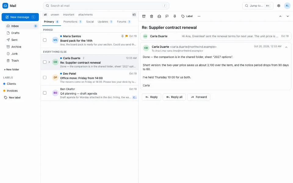 The webmail Inbox sorted into Primary, Promotions, Social, Updates and Forums tabs, a pinned message at the top, and a two-message conversation open in the reading pane.